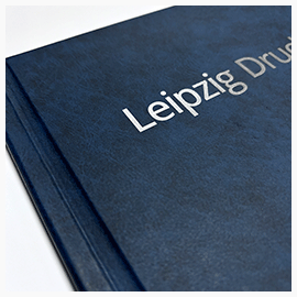 Drucke im Hardcover Kunstleder Blaue Kunstleder-Bindemappe mit Coverdruck in Silber