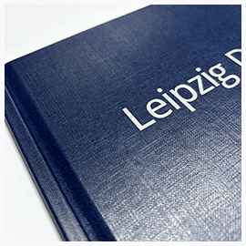 Drucke im Hardcover Leinenstruktur Bindemappe in Blau mit Coverbeschriftung in Silber
