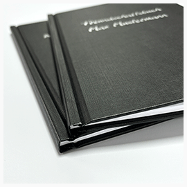 Drucke im Hardcover Leinenstruktur DIN A5 Ansicht der Bindemappe Hardcover Leinenstruktur in Schwarz